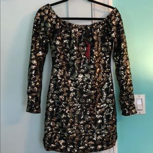 Gf the shoulder gold and black sequin dress